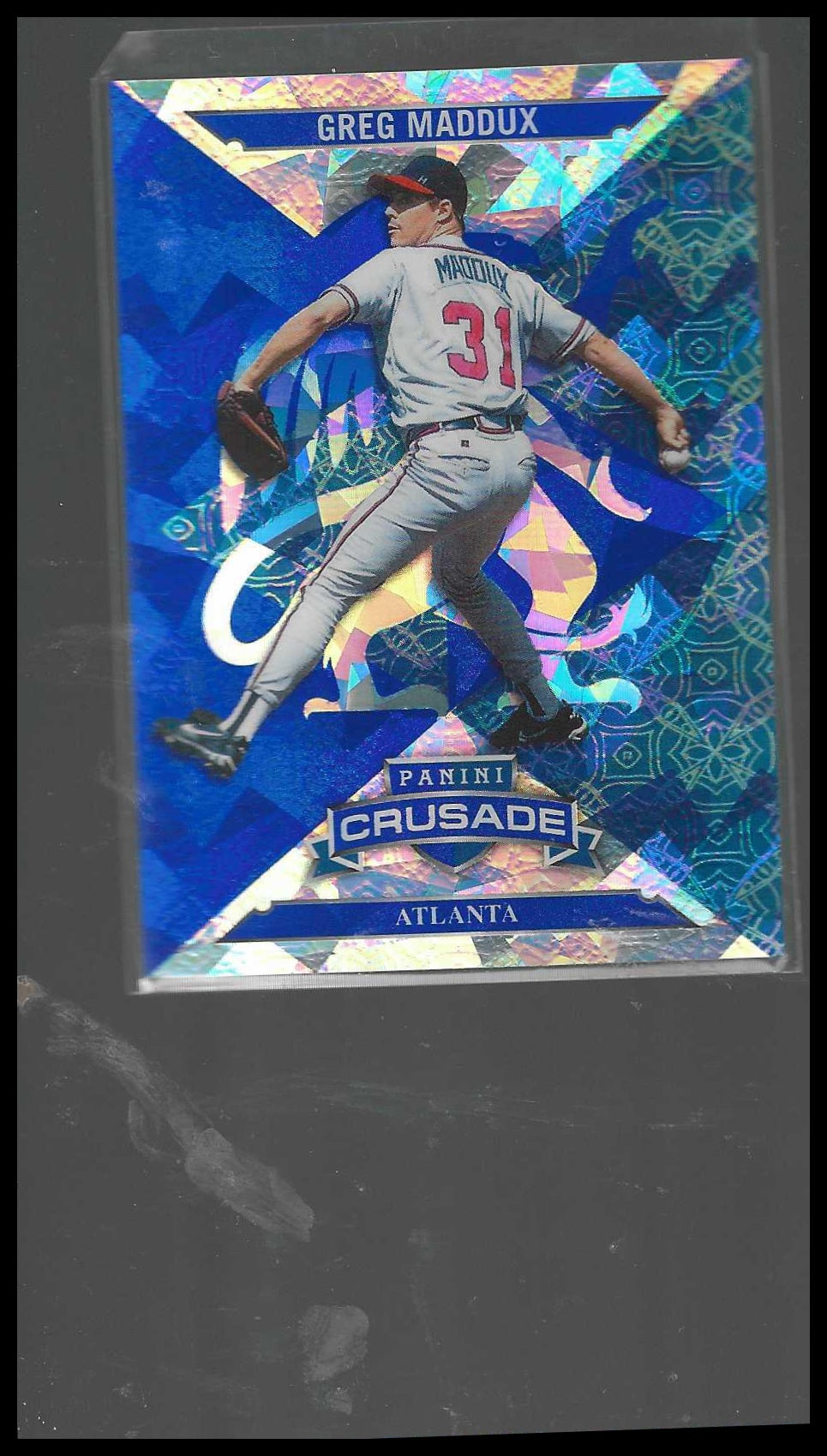 2025 Panini Crusade #19 Greg Maddux Crusade Blue Cracked Ice Atlanta Braves